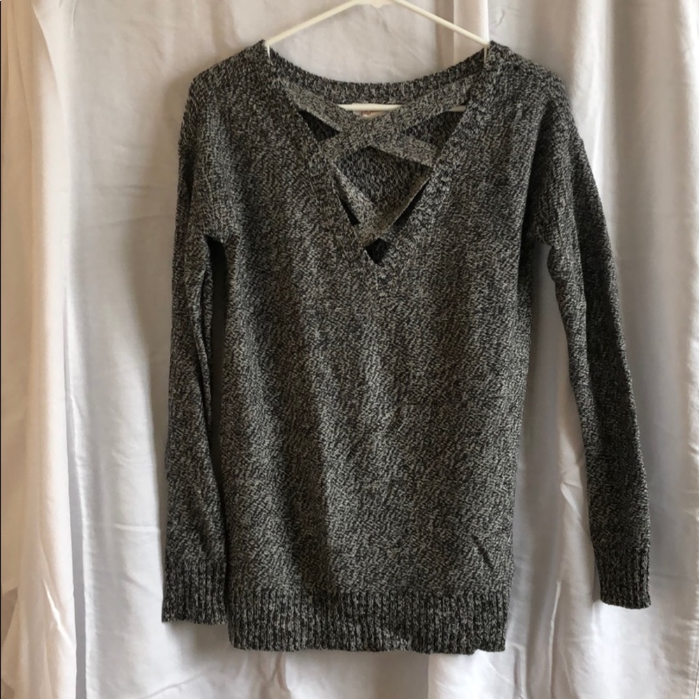 Sweater with cross cross detail